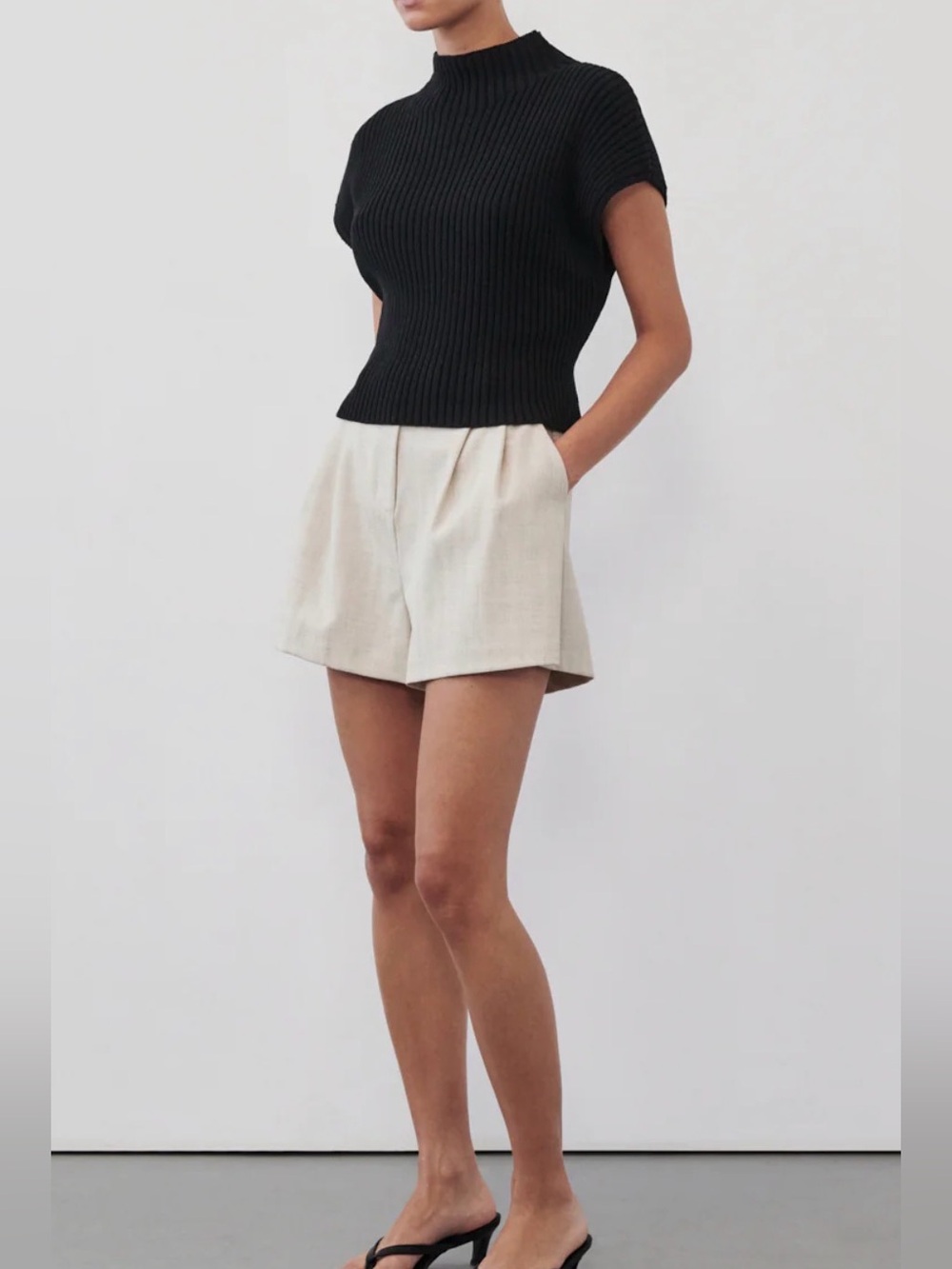 DISSH black sleeveless mock sweater top